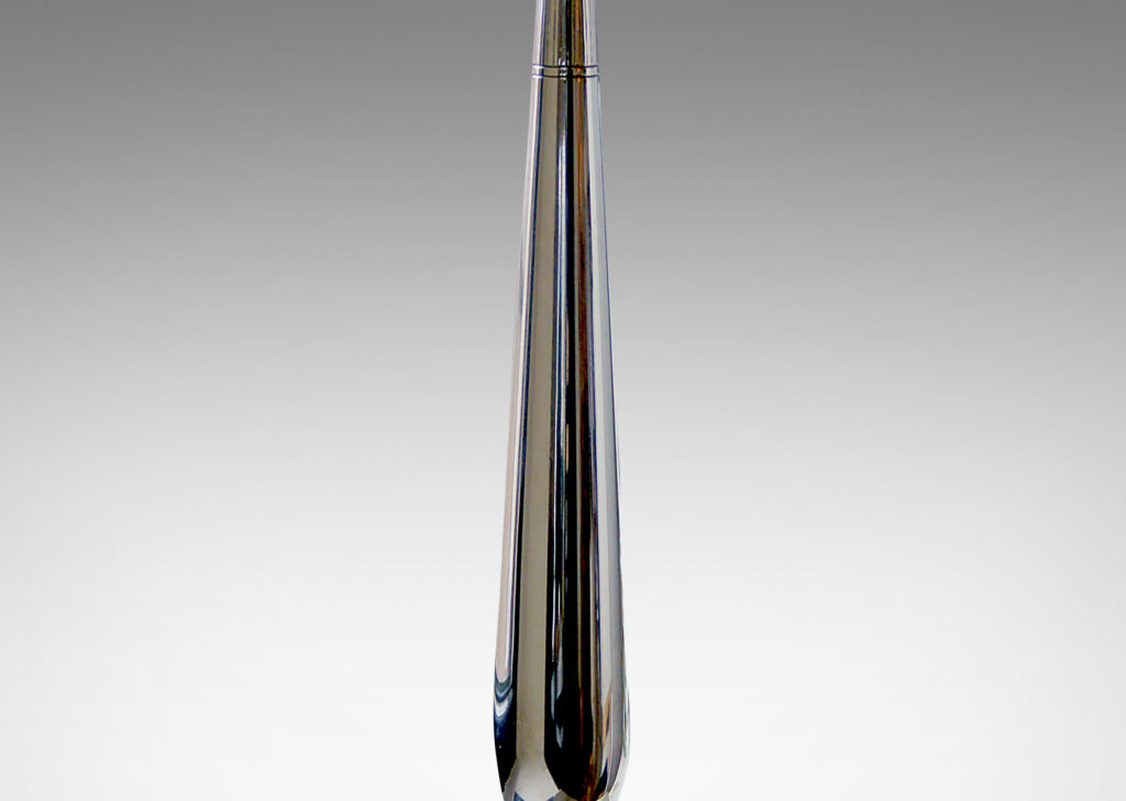 Gallery BAC column balanced on a smooth spherical fob on a square plinth with a large repoussé rosette in the center