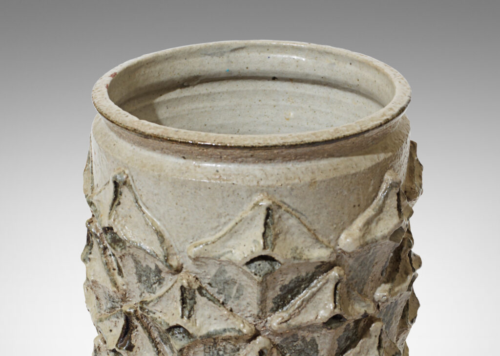 Gallery BAC cylindrical vase having a relief pattern of quatrefoil elements