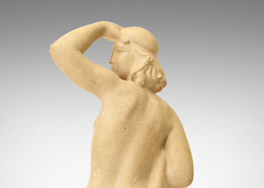 Gallery BAC statue depicting female nude looking back, in cast stone