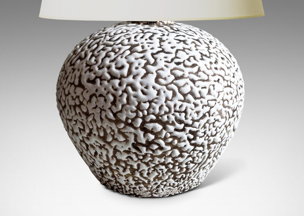 Gallery BAC angled and tapred globe forms in “crispé” beaded white over matte brown glazing