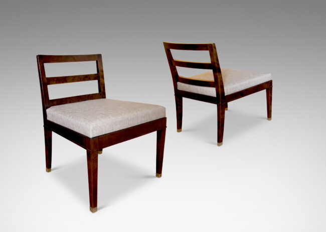 Gallery BAC slipper chairs crafted in stained Baltic birch