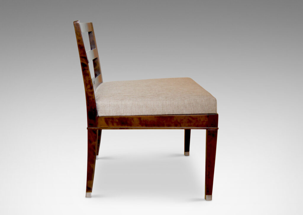 Gallery BAC slipper chairs crafted in stained Baltic birch