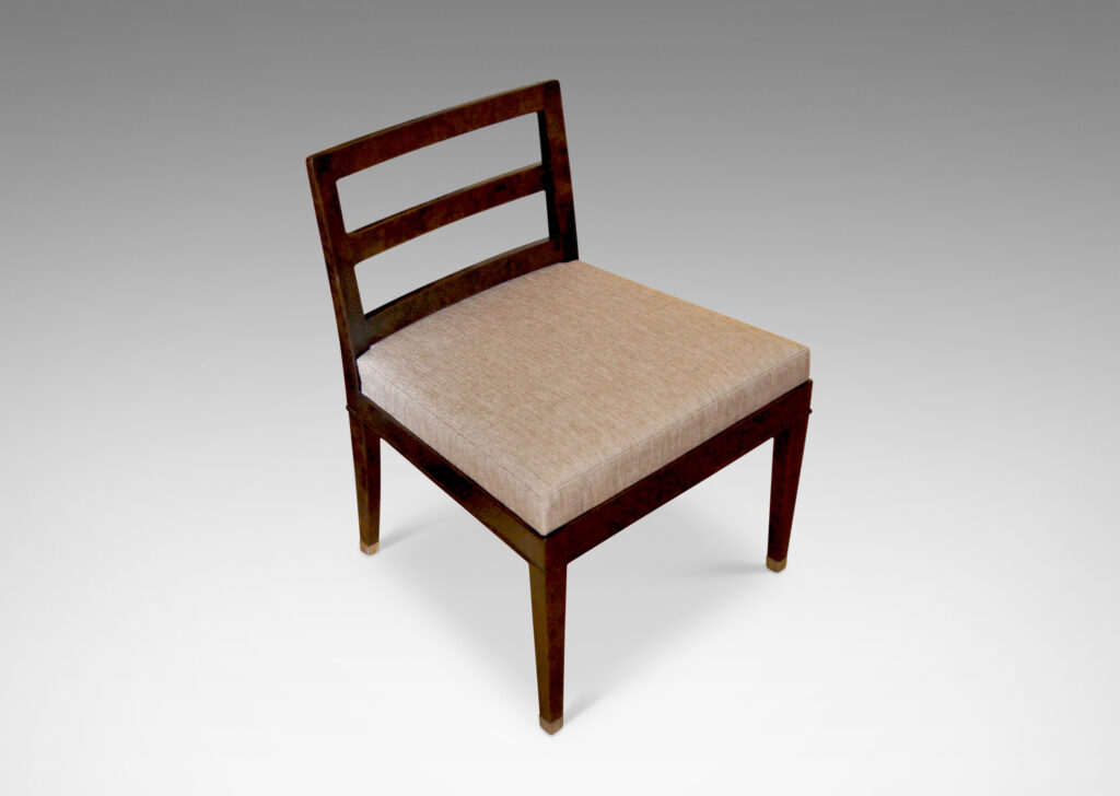 Gallery BAC slipper chairs crafted in stained Baltic birch