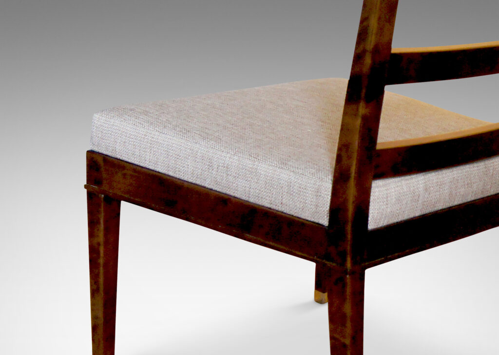 Gallery BAC slipper chairs crafted in stained Baltic birch