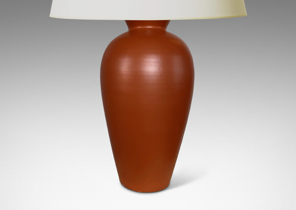 Gallery BAC apering forms in earthenware with a rich egg-shell finish burnt sienna red-brown glaze