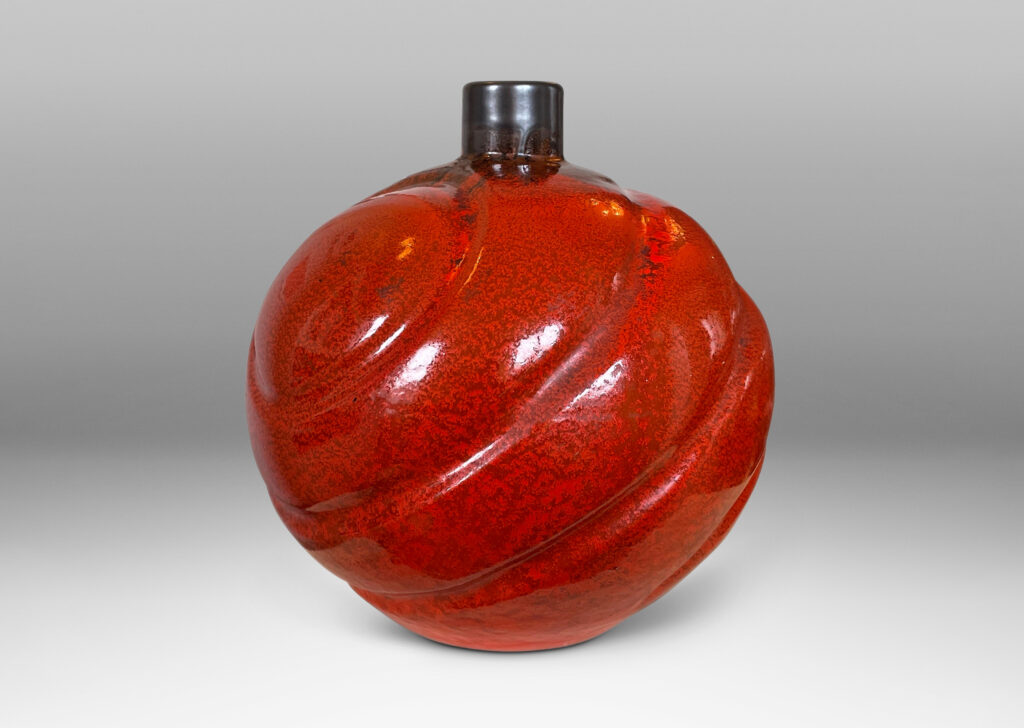 Gallery BAC tapering globe forms with concentric lobes in persimmon orange with luster charcoal glaze