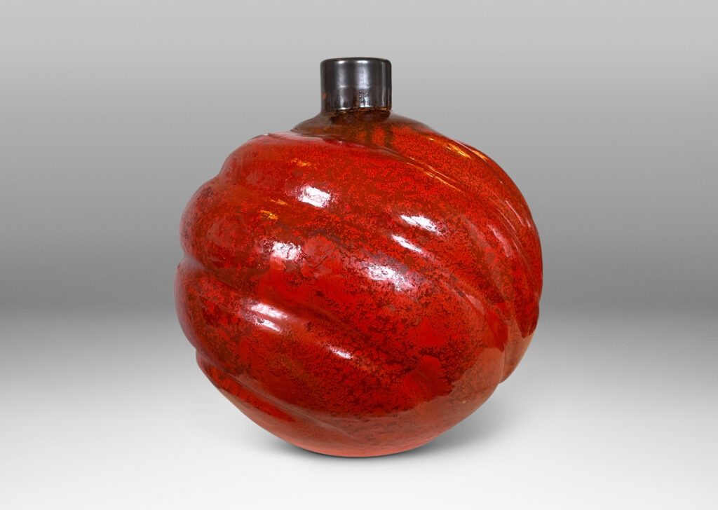 Gallery BAC tapering globe forms with concentric lobes in persimmon orange with luster charcoal glaze