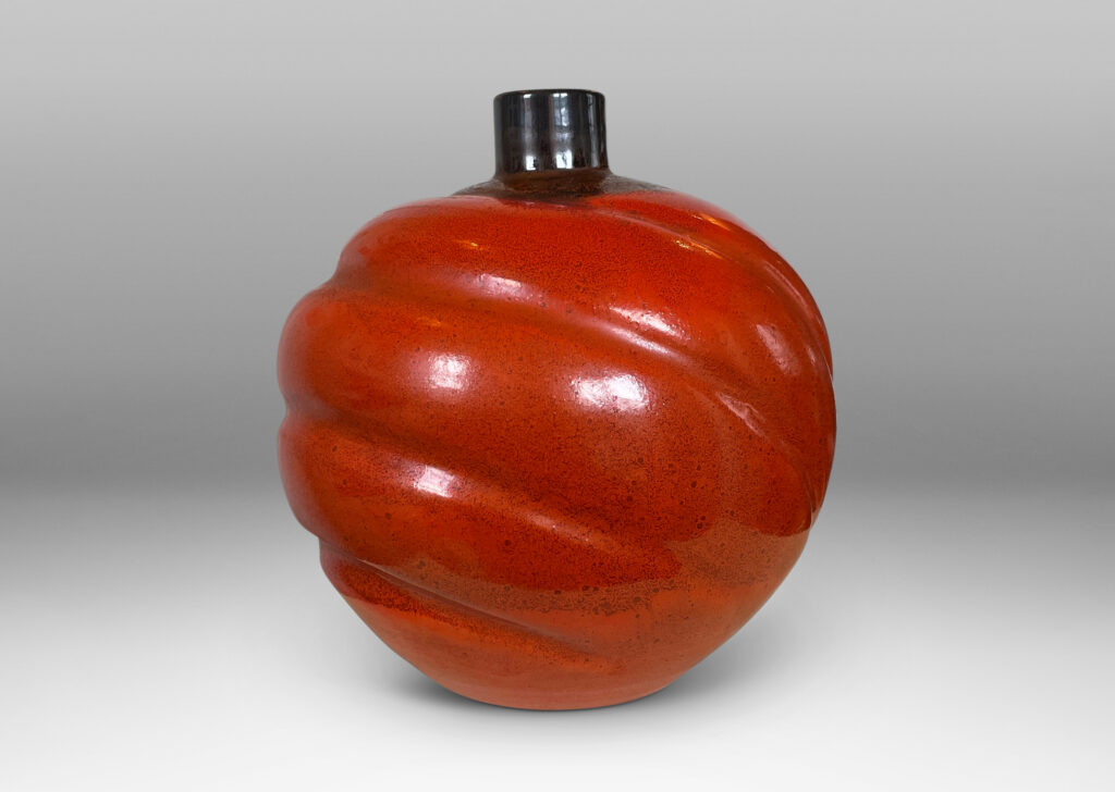 Gallery BAC tapering globe forms with concentric lobes in persimmon orange with luster charcoal glaze