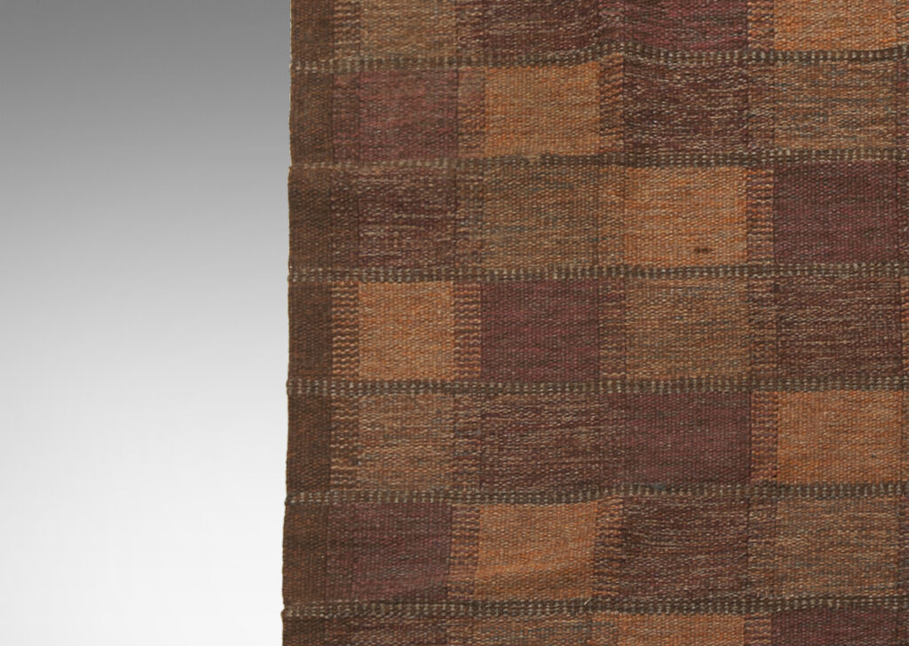 Gallery BAC Hand-woven wool flat-weave carpet with checker pattern in in marled purple, brown, and burnt orange yarns by Brita Grahn