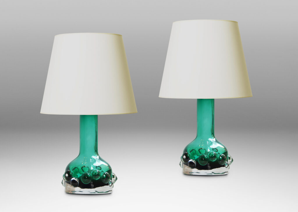 Gallery BAC bottle forms in clear glass with emerald green inside tint and applied bubble relief