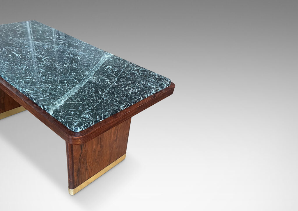 Gallery BAC rectangular top with rounded corners and inset marble surface on two rounded plank pier legs with a connecting shelf in palisander with original marble top, and brass sabots