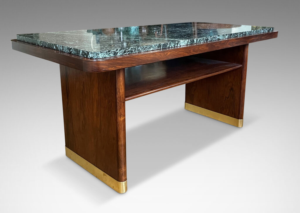 Gallery BAC rectangular top with rounded corners and inset marble surface on two rounded plank pier legs with a connecting shelf in palisander with original marble top, and brass sabots