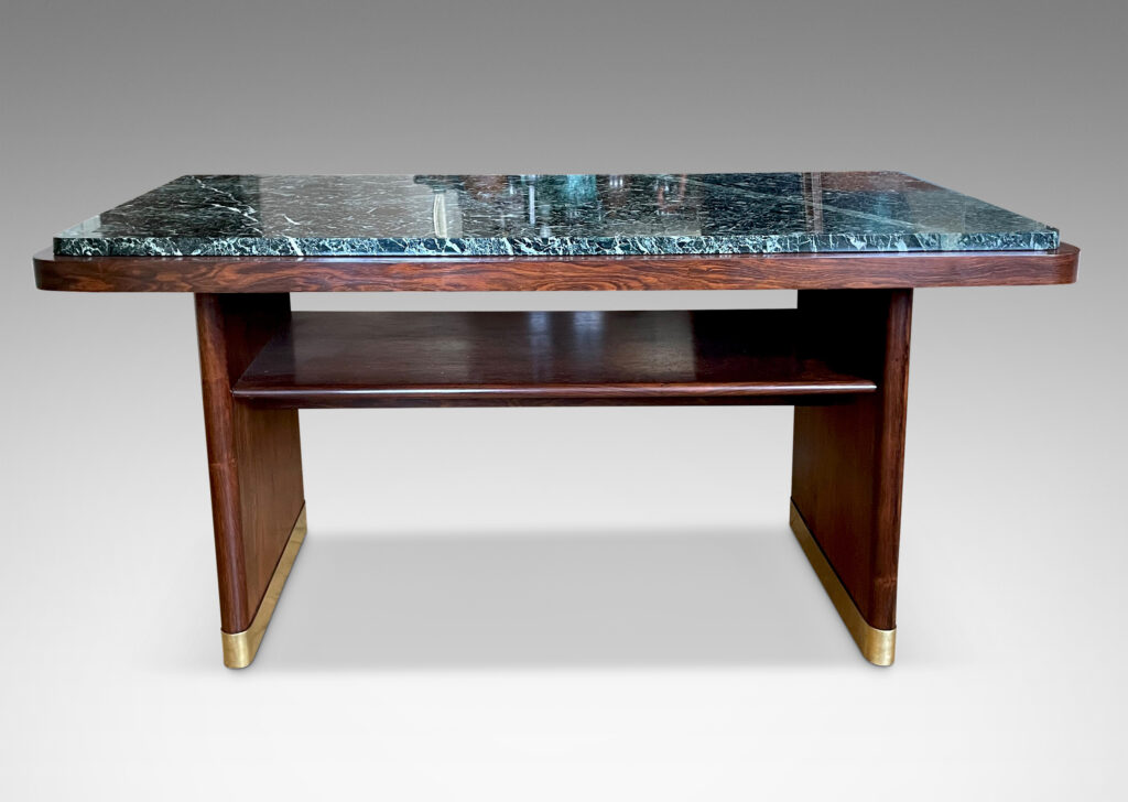 Gallery BAC rectangular top with rounded corners and inset marble surface on two rounded plank pier legs with a connecting shelf in palisander with original marble top, and brass sabots