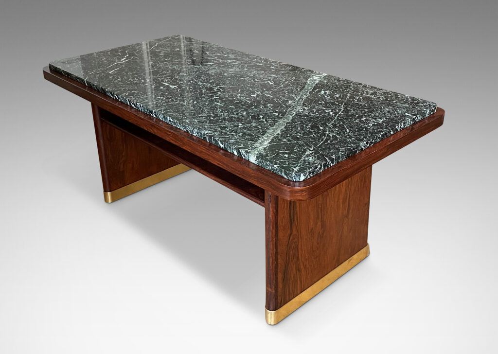 Gallery BAC rectangular top with rounded corners and inset marble surface on two rounded plank pier legs with a connecting shelf in palisander with original marble top, and brass sabots