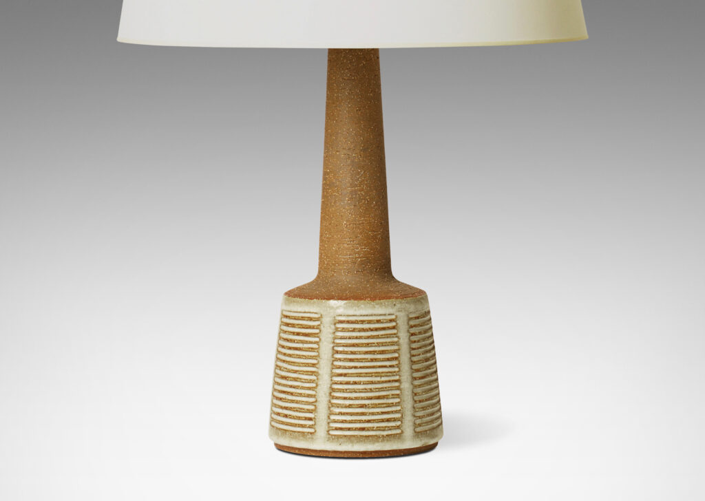 Gallery BAC long tapered neck on a flared drum base, in stoneware in a warm brown tone, partially glazed in a pale gray