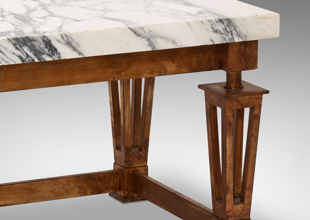 Gallery BAC gilded iron base with tapering legs set on block feet and connected by muscular stretchers, with original marble top