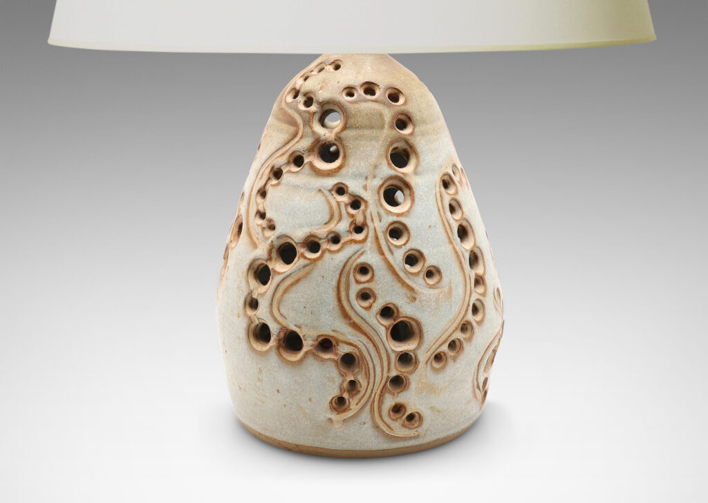 Gallery BAC pear-like form with openwork pattern and pale gray finish with brown accents