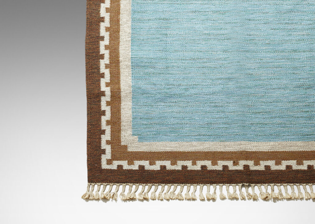 Gallery BAC triking marled cerulean field framed in a border featuring a Greek meander pattern in ivory against two shades of brown