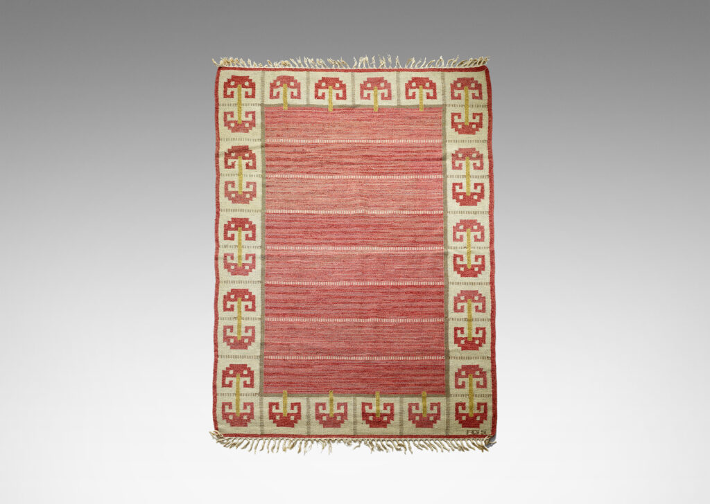 Gallery BAC field of broad stripes of modulating red hues in marled yarns with border of double and single umbel shapes in red, gold and ivory