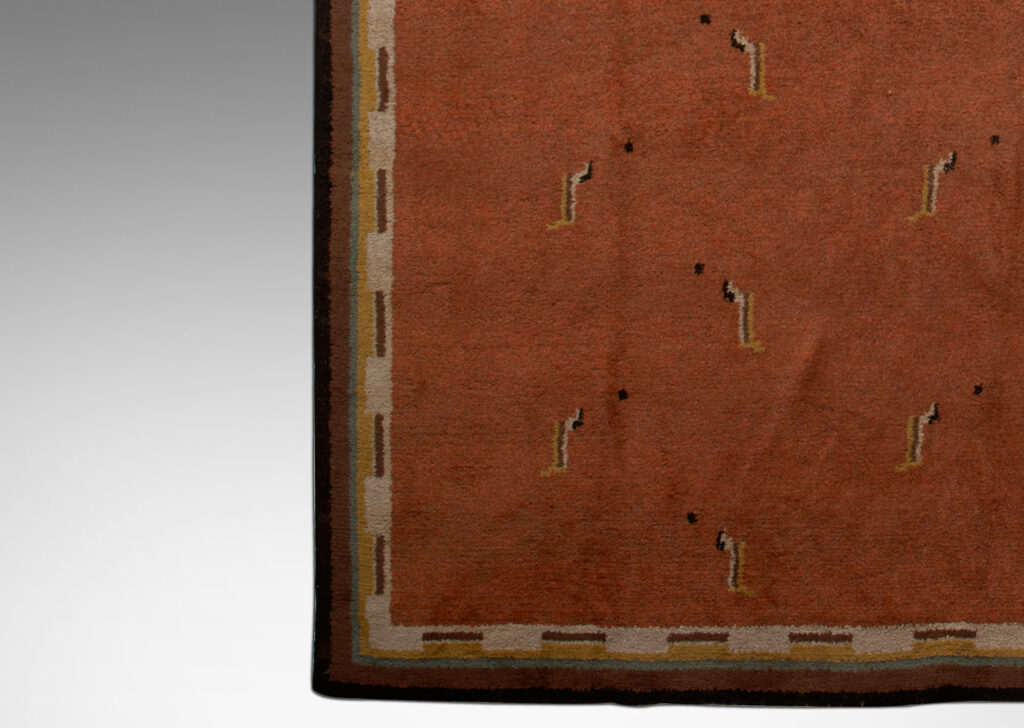 Gallery BAC salmon and brown marled field with motifs and Greek key border in ochre, brown and cream, hand-knotted wool