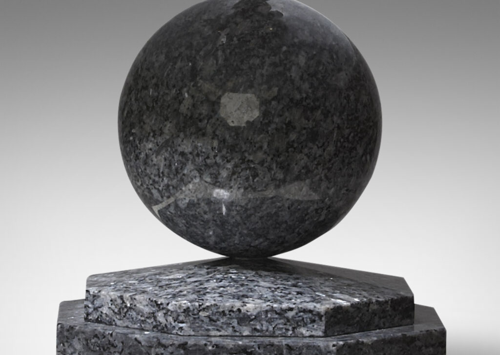 Gallery BAC sphere on a stepped octagonal plinth, solid polished granite