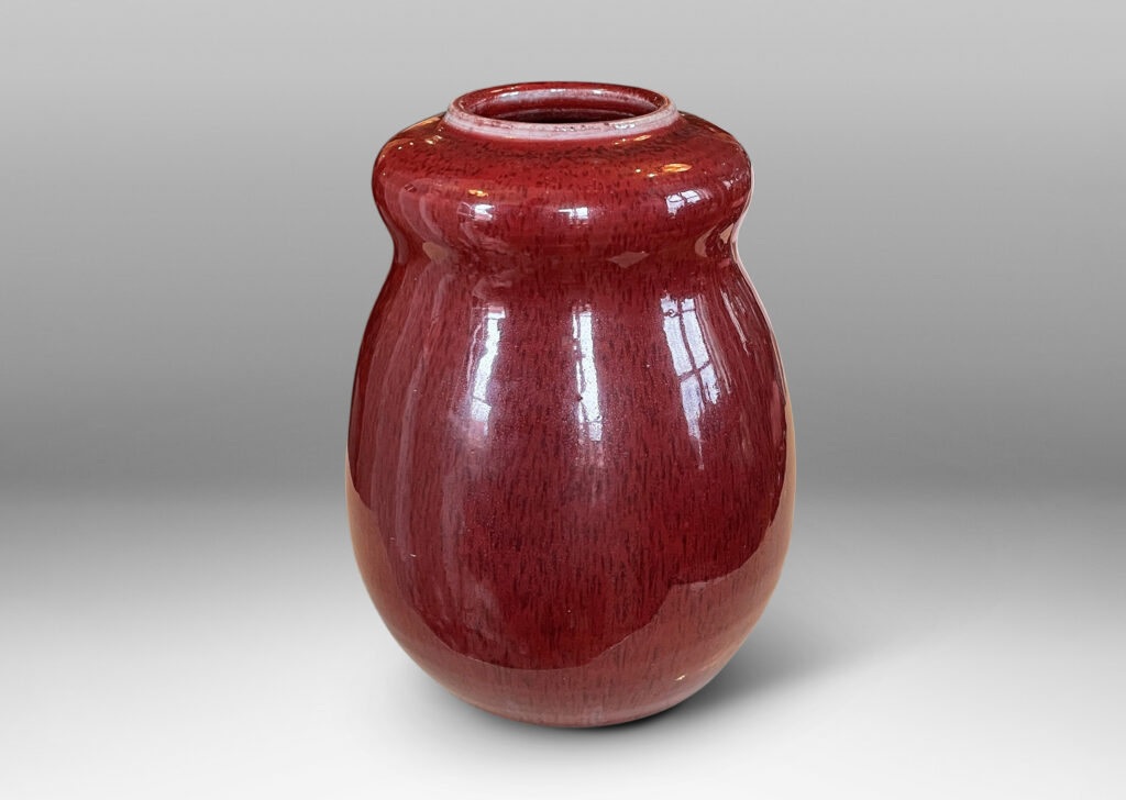 Gallery BAC double gourd form with a magnificent oxblood glazing with subtle harefur texture