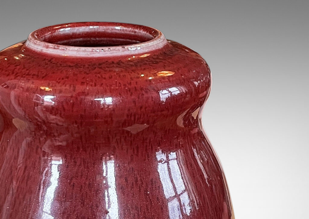 Gallery BAC double gourd form with a magnificent oxblood glazing with subtle harefur texture