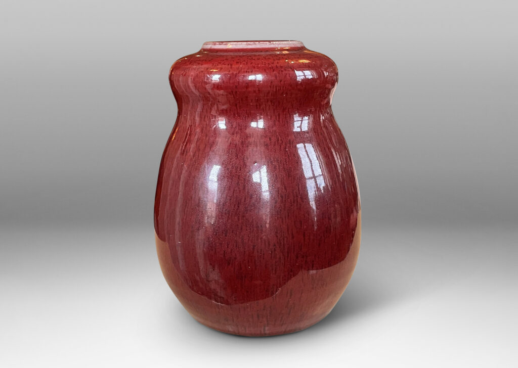 Gallery BAC double gourd form with a magnificent oxblood glazing with subtle harefur texture