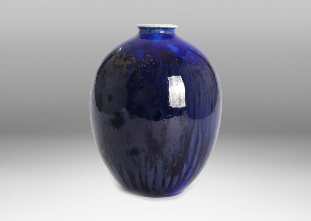 Gallery BAC having a large tapering ovoid form with a saturated blue flowing crystalline glaze