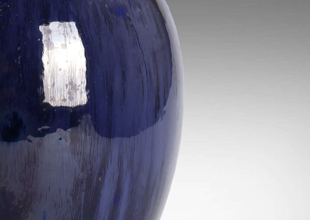 Gallery BAC having a large tapering ovoid form with a saturated blue flowing crystalline glaze