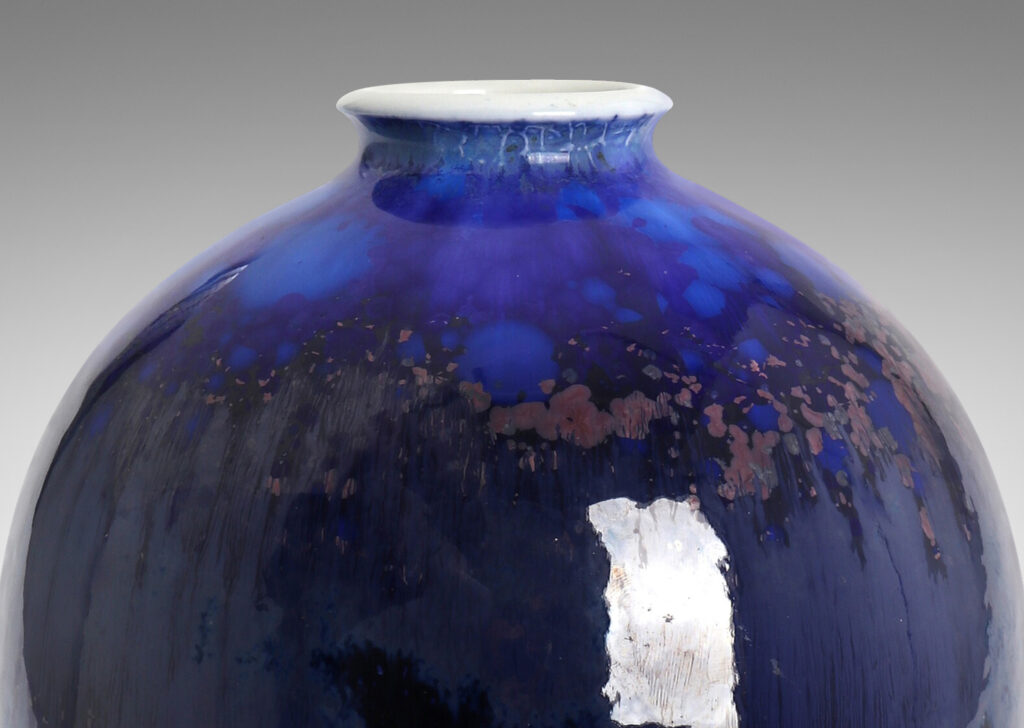 Gallery BAC having a large tapering ovoid form with a saturated blue flowing crystalline glaze