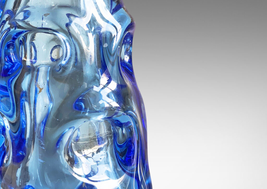 Gallery BAC ovoid form pedestal base was hand-blown in thick glass in a marvelous ultramarine blue tint