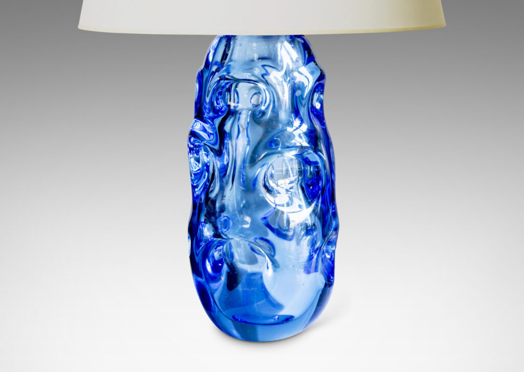 Gallery BAC ovoid form pedestal base was hand-blown in thick glass in a marvelous ultramarine blue tint