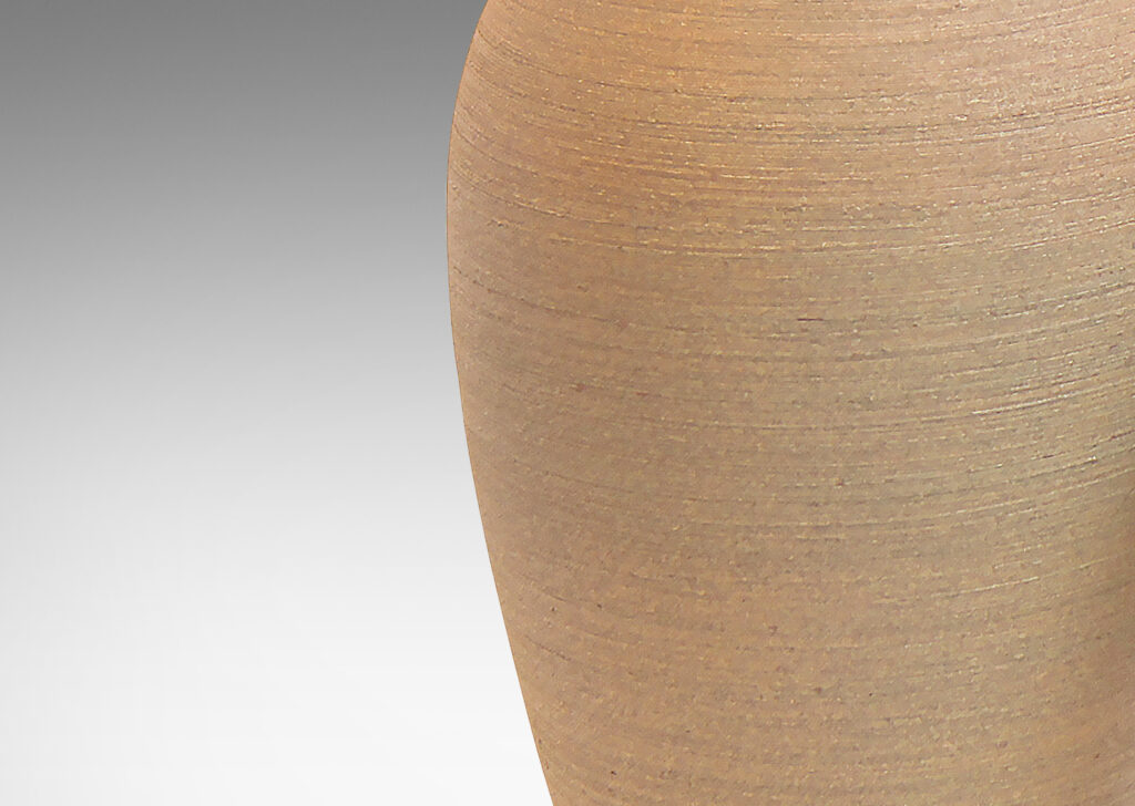 Gallery BAC slightly different size variant of the same model, featuring elegantly modeled tapering forms finished with a beautifully executed raked texture and matte ochre glaze on the outside