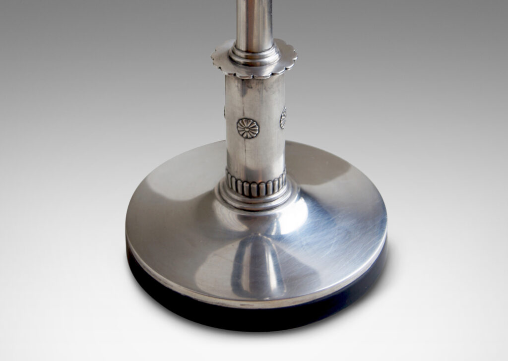 Gallery BAC ound column stand tapering up to a demi-sphere fob cab, mounted below to a cylindrical pedestal ornamented with rosette collar