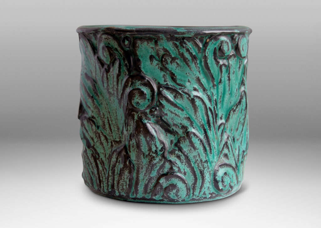 Gallery BAC hand-formed and carved in earthenware glazed to great effect in teal layered with black to add shows and depth