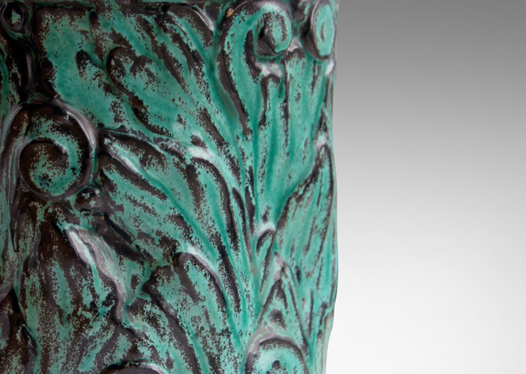 Gallery BAC hand-formed and carved in earthenware glazed to great effect in teal layered with black to add shows and depth