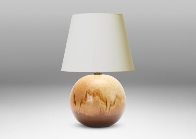 Gallery BAC globe form in stoneware with a flowing gold/acorn over brown glazing