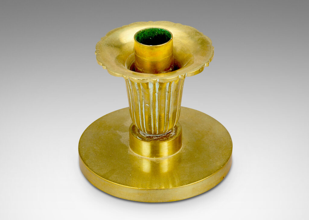 Gallery BAC disk plinths and stylized floral bobeches; brass