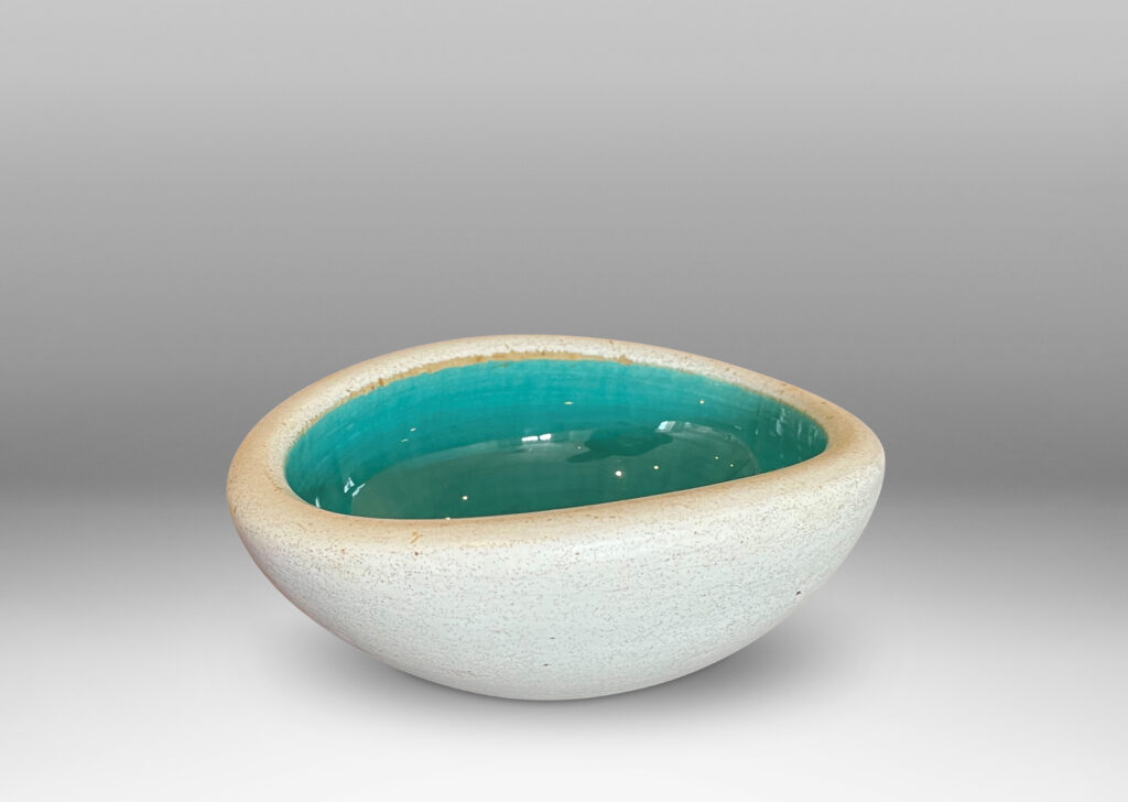 Gallery BAC modeled oblong form with eggshell ivory and gloss turquoise glazing