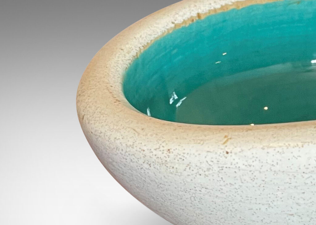 Gallery BAC modeled oblong form with eggshell ivory and gloss turquoise glazing