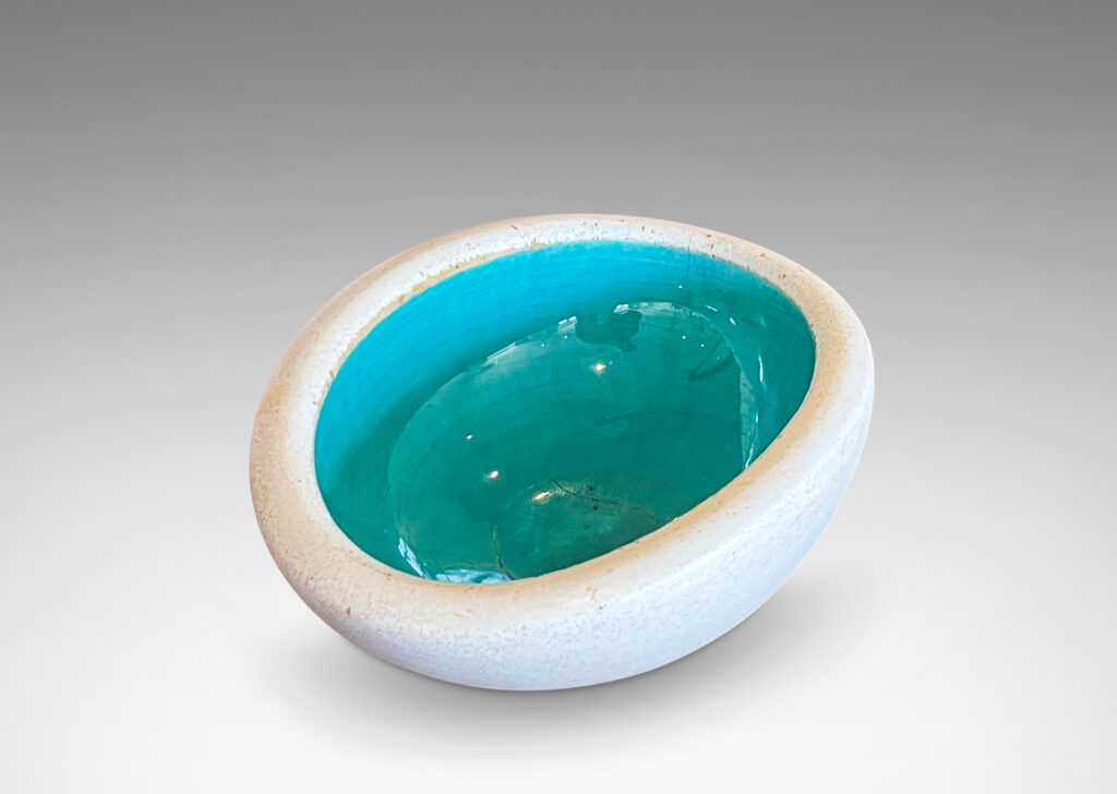 Gallery BAC modeled oblong form with eggshell ivory and gloss turquoise glazing