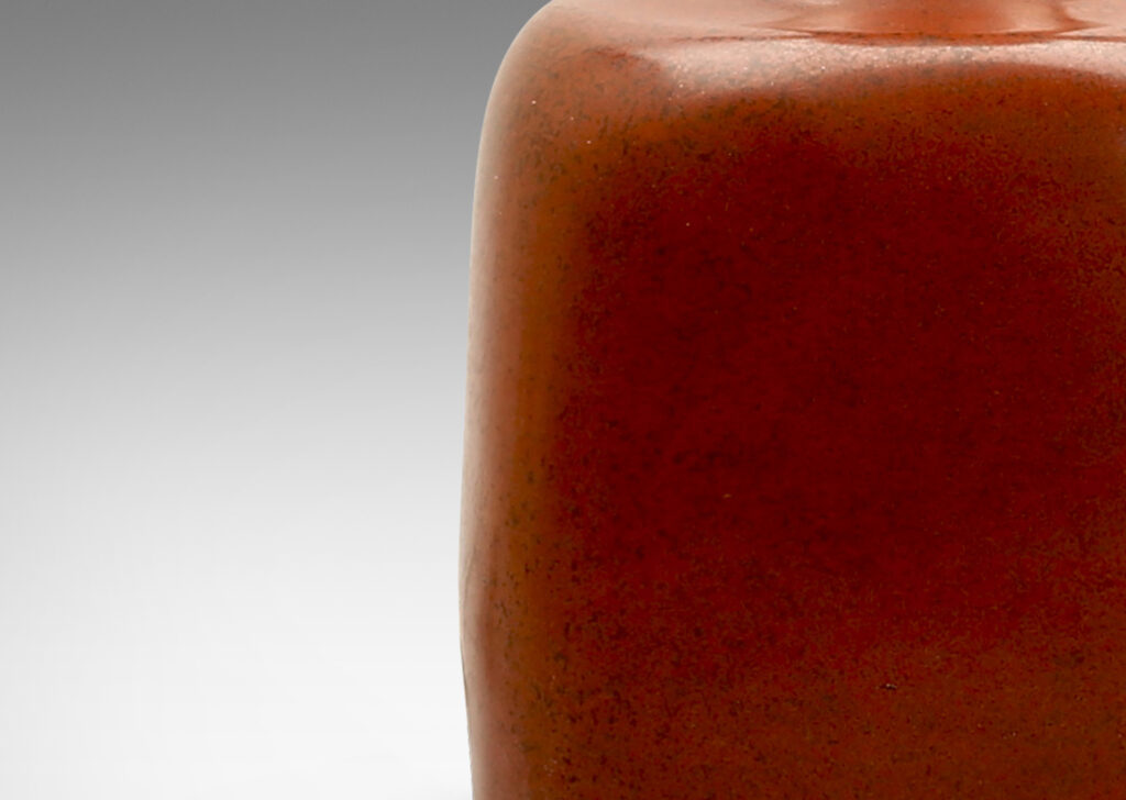 Gallery BAC square bottle form in hand-thrown stoneware glazed in an eggshell vermillion