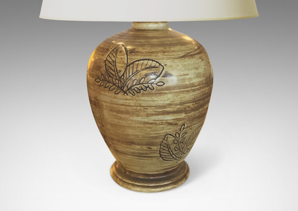 Gallery BAC traditional tapering form with articulated plinth base and carved leafy motifs