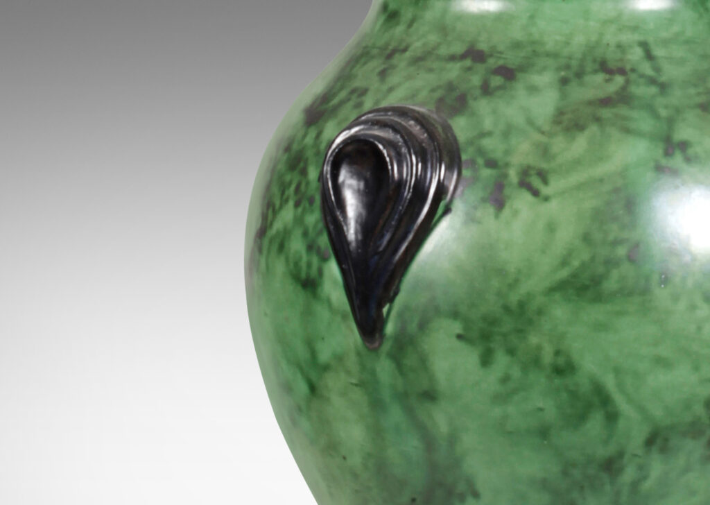 Gallery BAC tapered form in a brushed green emulating malachite or marble, with black accents; earthenware