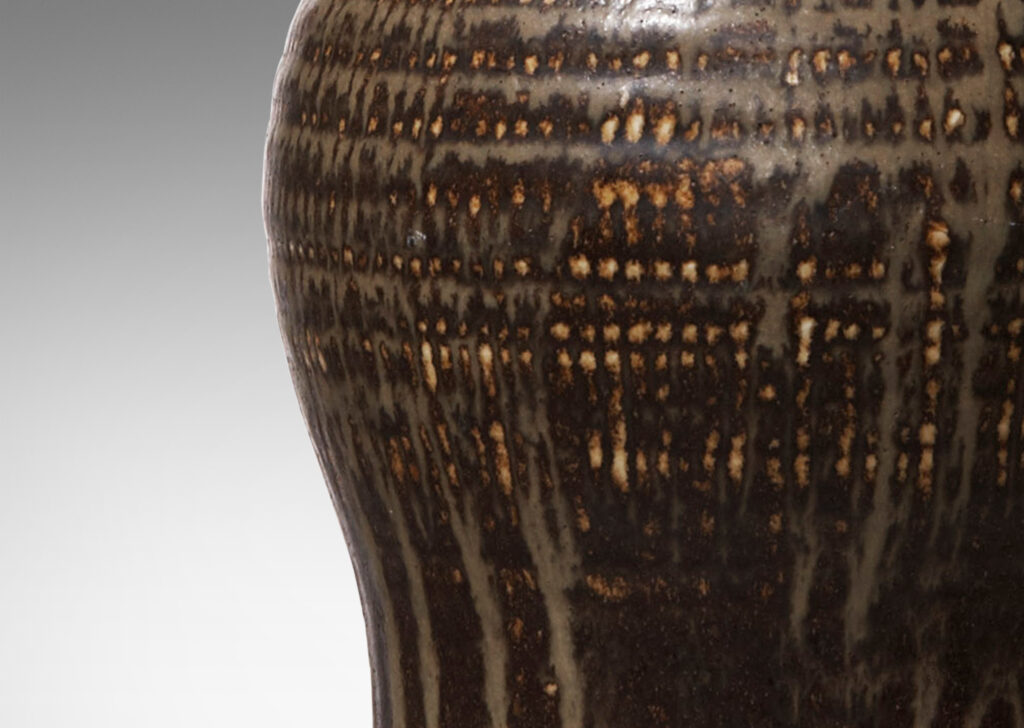 Gallery BAC organic form and stippled pattern around mouth and on shoulders in stoneware with sage green glaze flowing over brown