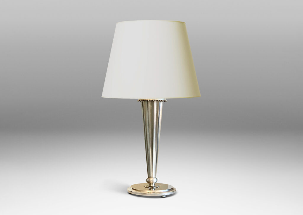 Gallery BAC fluted tapering stand with serrated collar and disk plinth; silver plated metal