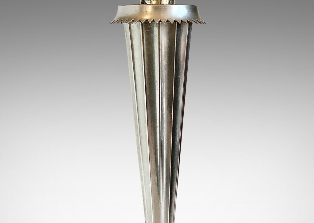 Gallery BAC fluted tapering stand with serrated collar and disk plinth; silver plated metal