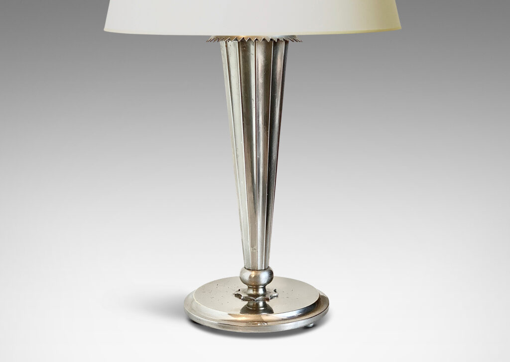 Gallery BAC fluted tapering stand with serrated collar and disk plinth; silver plated metal