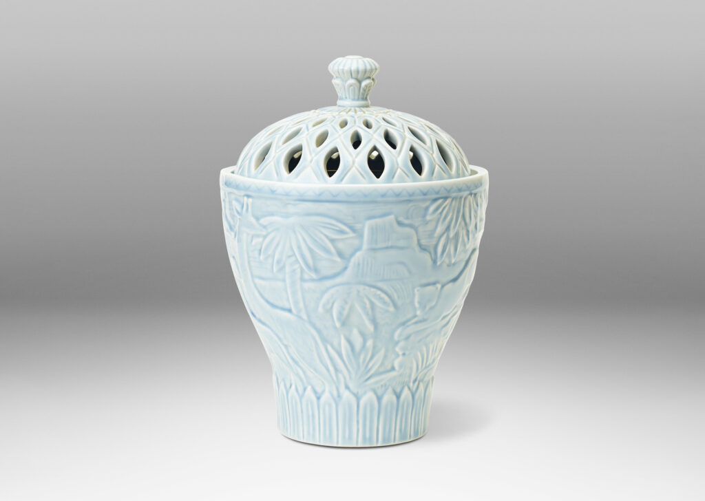 Gallery BAC Urn with perforated lid with relief depicting African savanna fauna and flora